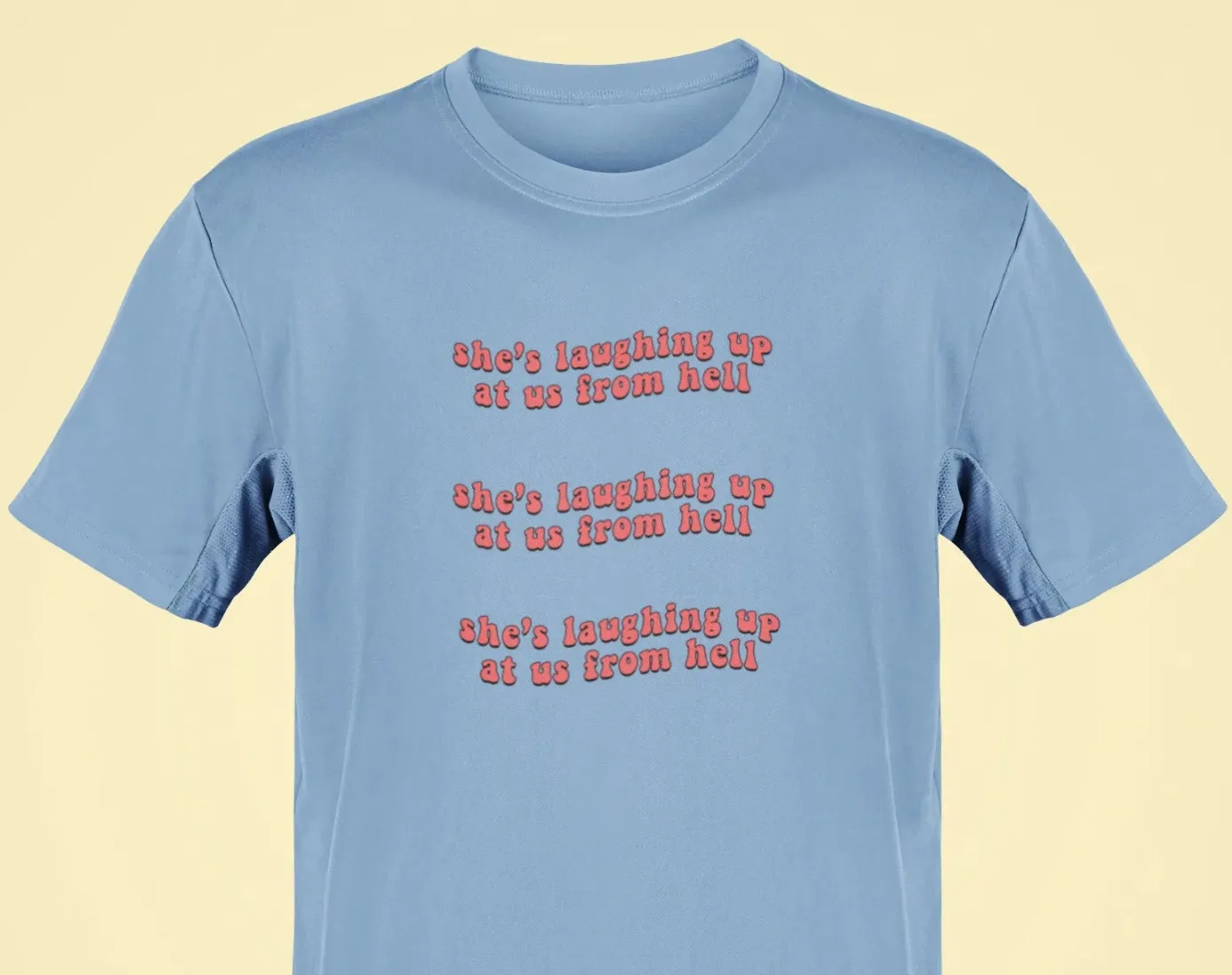 She's laughing up at us from hell Oversized T-Shirt
