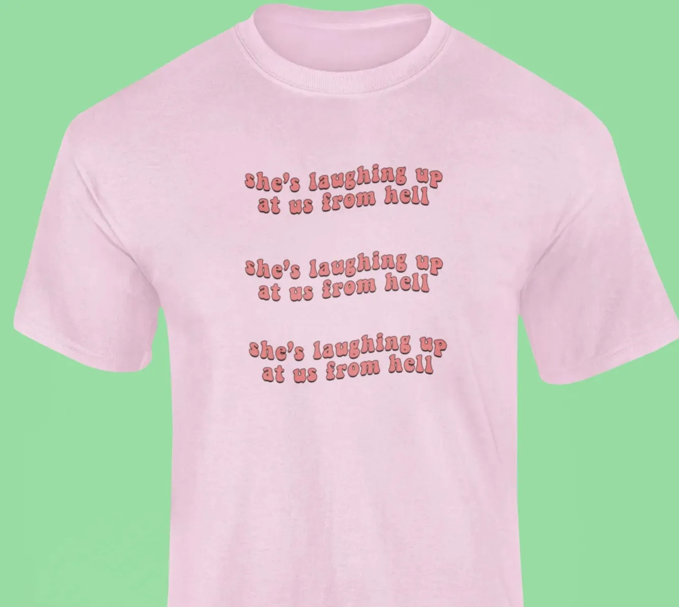 She's laughing up at us from hell T-Shirt